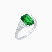 Art Deco Inspired Emerald Cut Three-Stone Ring with Tapered Baguettes - Shahin Jewelry